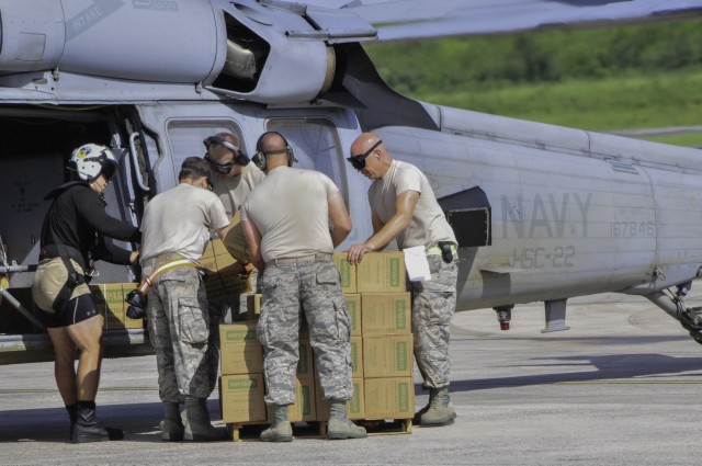 Joint effort moves personnel, cargo to storm victims