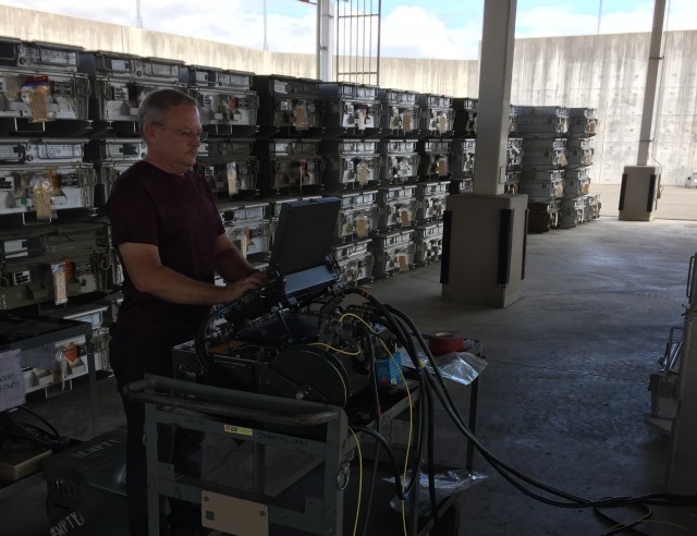 A Letterkenny Munitions Center technician performs tests on U.S. Anti-Radiation Missiles onsite in Japan.