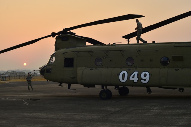Oregon Army National Guard Soldiers douse Whitewater Fire