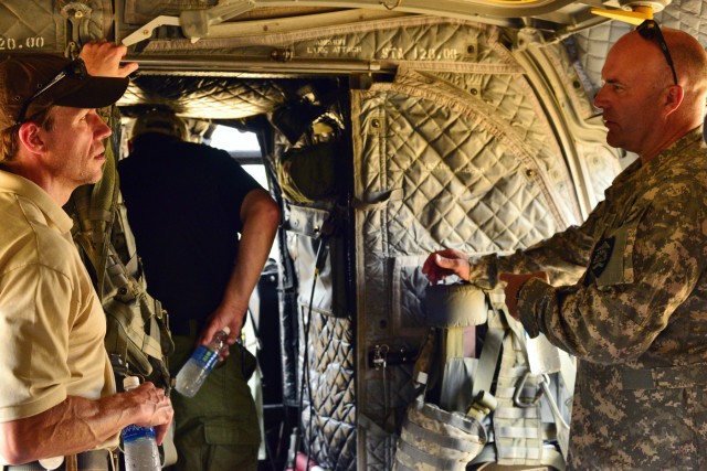 Oregon Army National Guard Soldiers douse Whitewater Fire