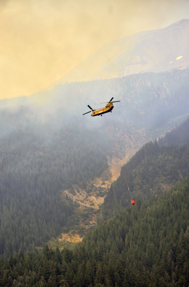 Oregon Army National Guard Soldiers douse Whitewater Fire