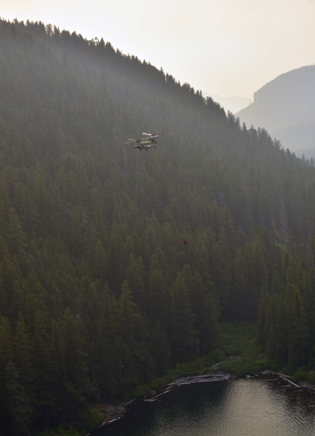 Oregon Army National Guard Soldiers douse Whitewater Fire