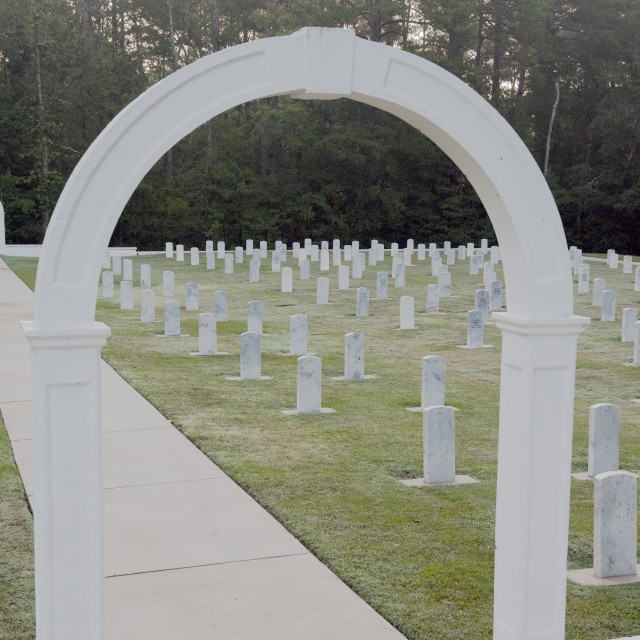 Headstone realignment begins