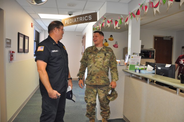 MAHC security guard interacts with staff members