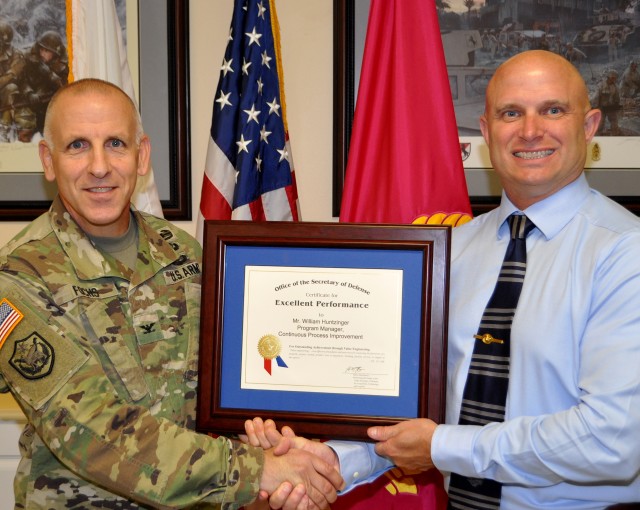 COL Norbert Fochs Congratulates Blue Grass Army Depot DoD VE Winner