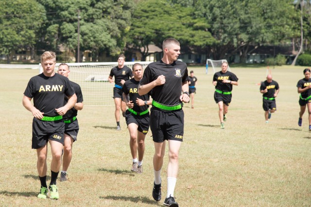 Warrior Brigade Troopers stretch for readiness