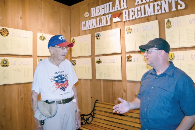 Dr. Claude Harwood, 93 years old and a World War II veteran, visited Fort Riley, Kansas, and the 1st Infantry Division to recall his service with the Big Red One.