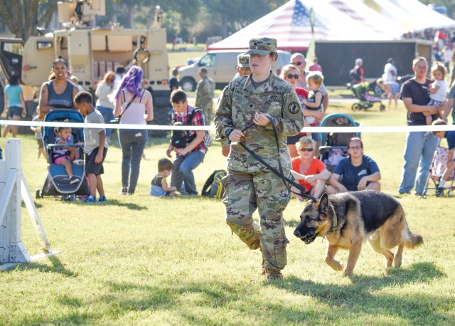 the 523rd Military Working Dog Detachment, 97th Military Police Battalion, Fort Riley, Kansas, did not disappoint as many of over 12,000 patrons watched their demonstration