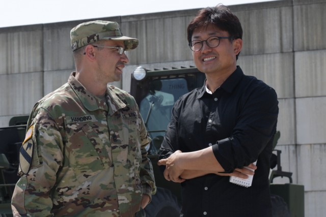 KBS News reporter talks with 6-52 ADA BN CSM