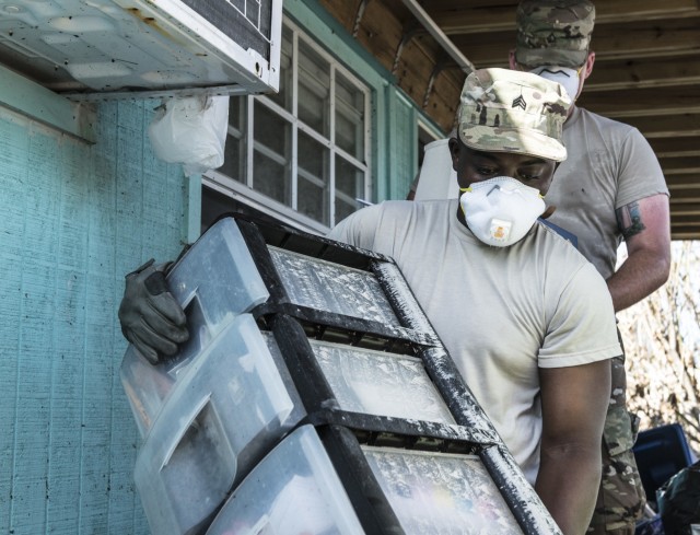 Florida National Guard clears Hurricane Irma debris from homes