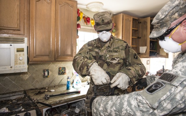 Florida National Guard clears Hurricane Irma debris from homes