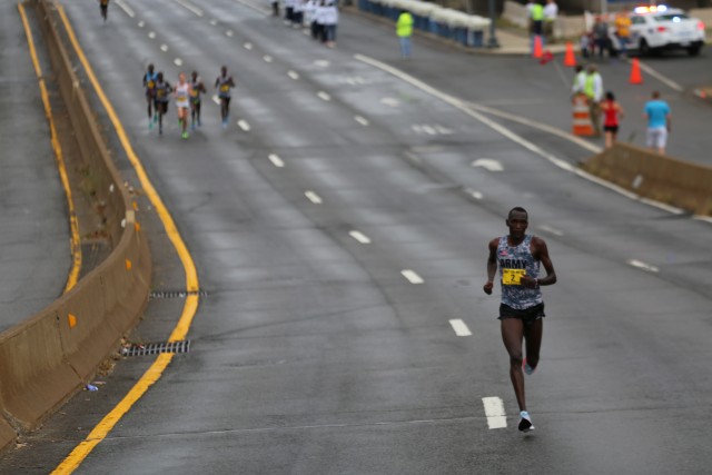 Spc. Haron Lagat keeping sub-five-minute mile pace