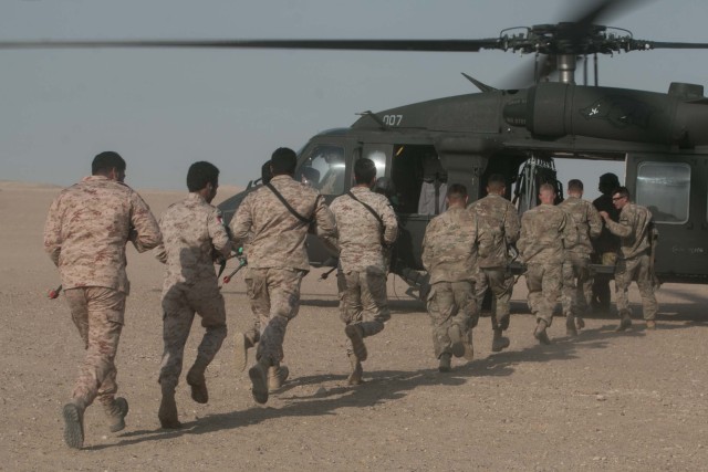Up, up and away: Cavalry Soldiers conduct air assault training with Kuwaiti partners