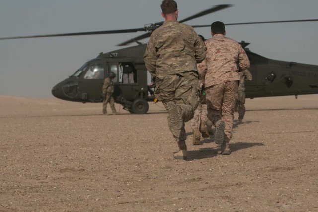 Up, up and away: Cavalry Soldiers conduct air assault training with Kuwaiti partners