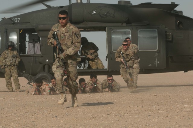 Up, up and away: Cavalry Soldiers conduct air assault training with Kuwaiti partners