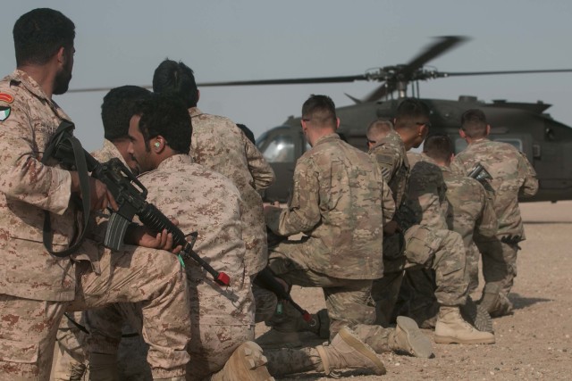 Up, up and away: Cavalry Soldiers conduct air assault training with Kuwaiti partners