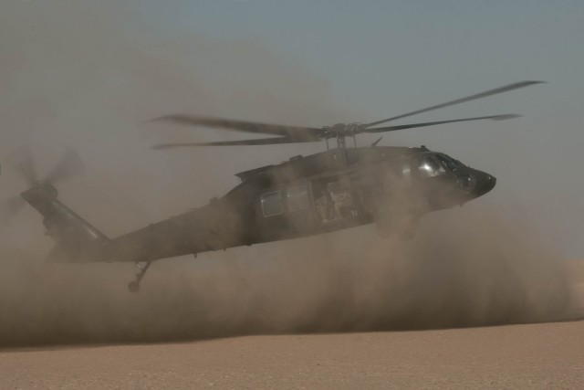 Up, up and away: Cavalry Soldiers conduct air assault training with Kuwaiti partners