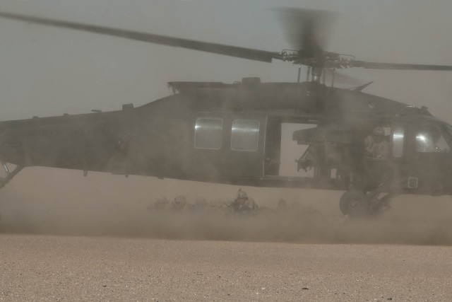 Up, up and away: Cavalry Soldiers conduct air assault training with Kuwaiti partners