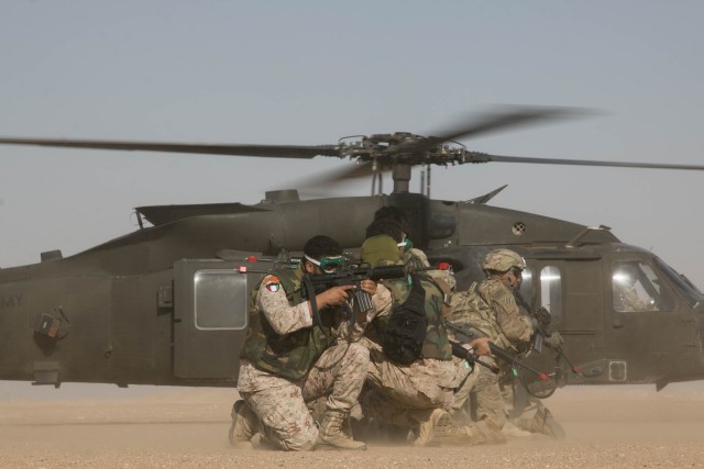 Up, up and away: Cavalry Soldiers conduct air assault training with Kuwaiti partners
