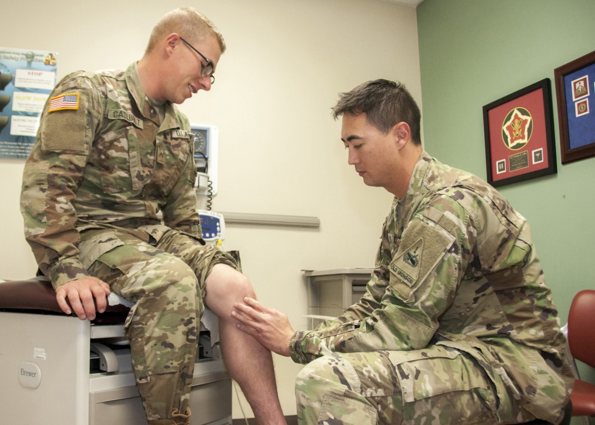 Soldier receiving medical attention