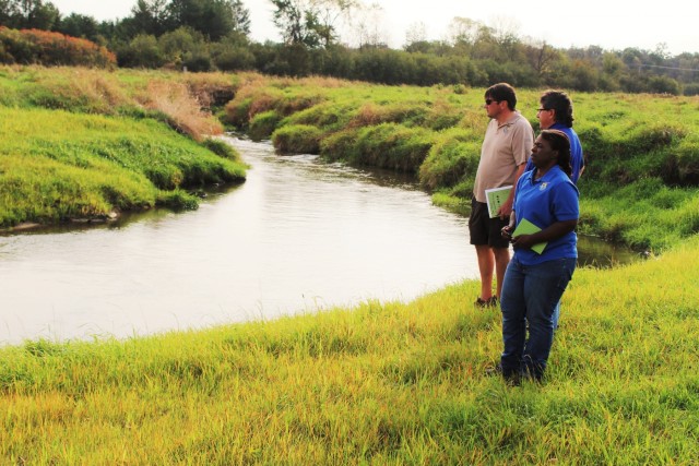 USFWS staff visits McCoy; observes progress of stream-habitat improvement