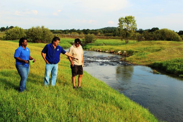 USFWS staff visits McCoy; observes progress of stream-habitat improvement