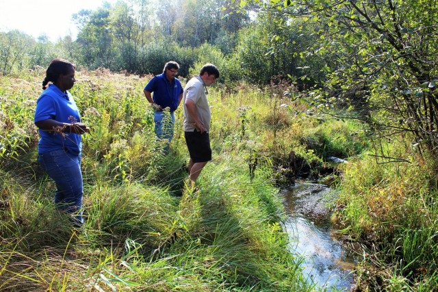 USFWS staff visits McCoy; observes progress of stream-habitat improvement