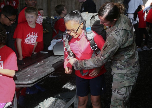 Soldiers from 1st SFG (A) reach out to Local Cross Country Team