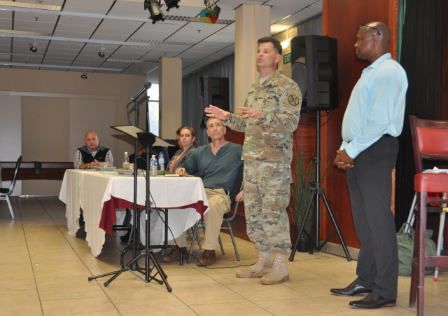 Col. Connell speaks to Brussels community