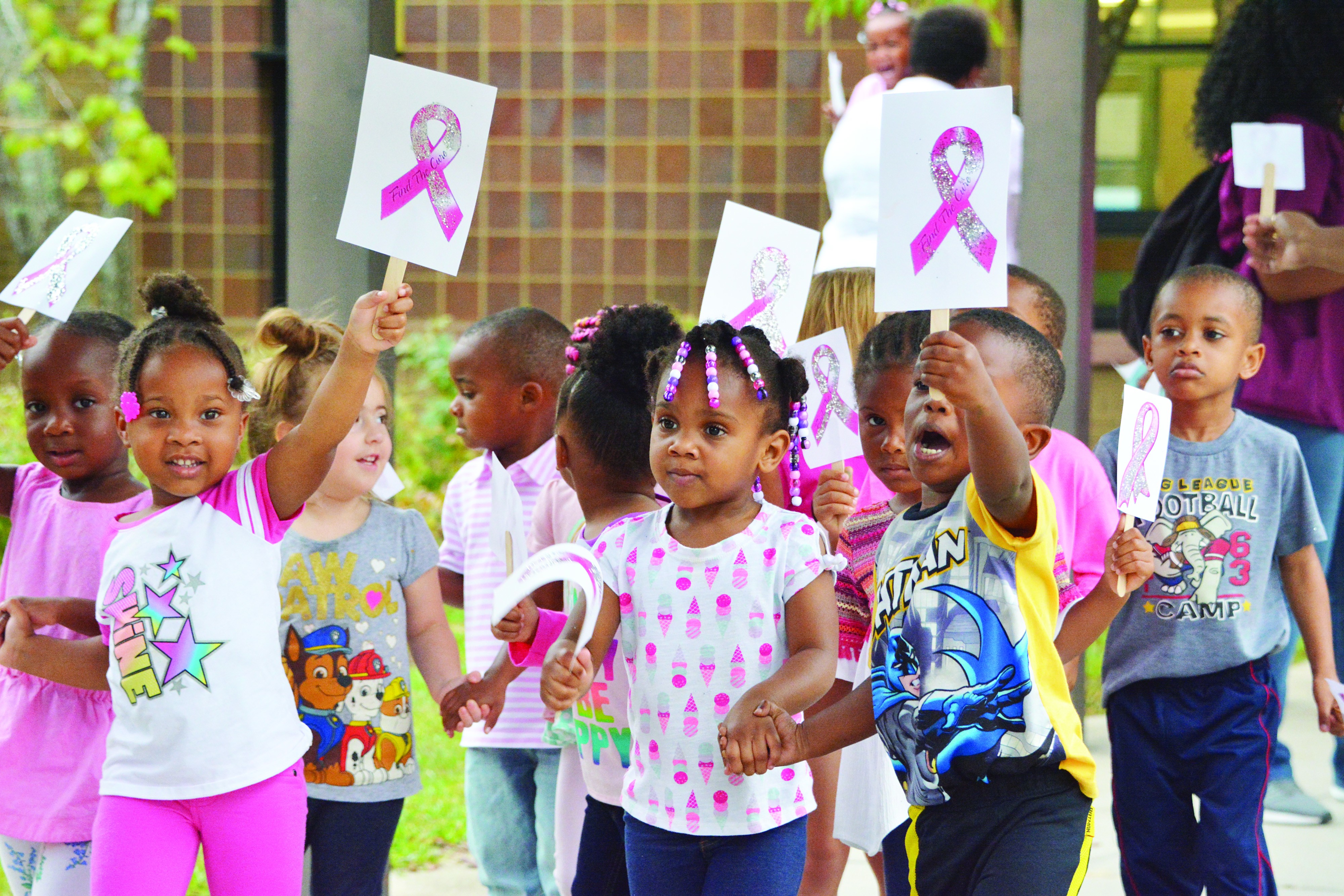 Children walk to raise awareness for breast cancer Article The