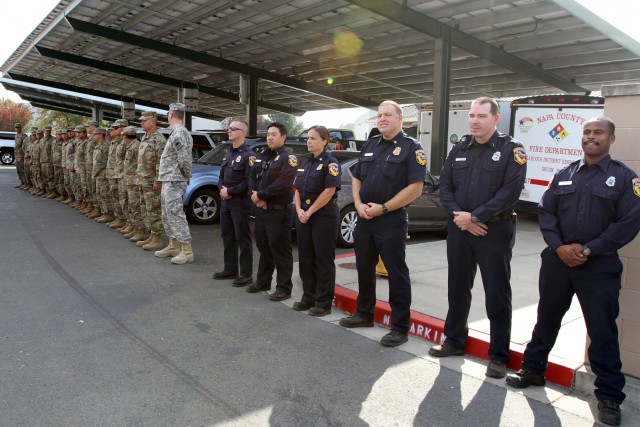 California Guard members pay respect to fallen firefighter