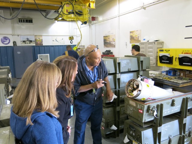 Herb Bailey shows Letterkenny Munitions Center's High-Speed Anti-Radiation Missile operations to Rep. Bill Shuster's Legislative Director and Deputy District Director.