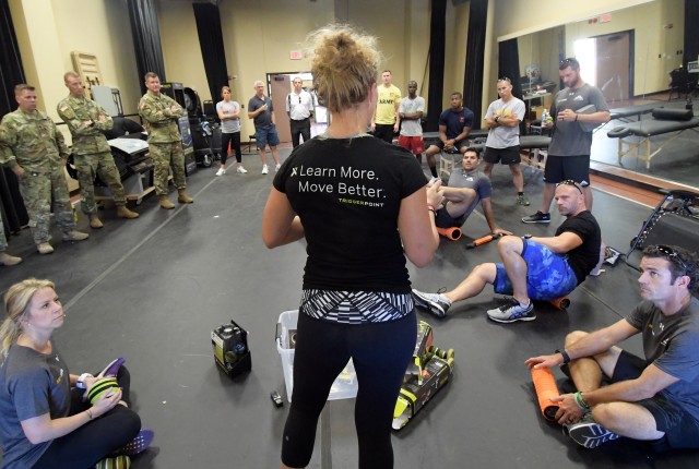 Master trainer Britny Fowler instructs BOSS Strong coaches/trainers & Army leaders