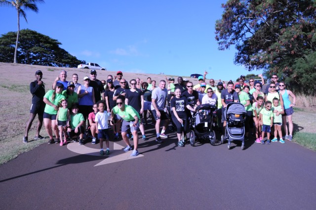 Participants wear lime green attire and ribbons to support Gastroschisis Awareness Day during the walk/run held the day before at Tripler Army Medical Center.
