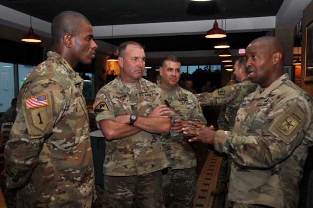 Army Chief Information Officer, Lt. Gen. Bruce Crawford, mentors Signal Soldiers during a no-host social as part of Pacific Signal Week 2017. The social was held at the Nehelani Club on Schofield Barr