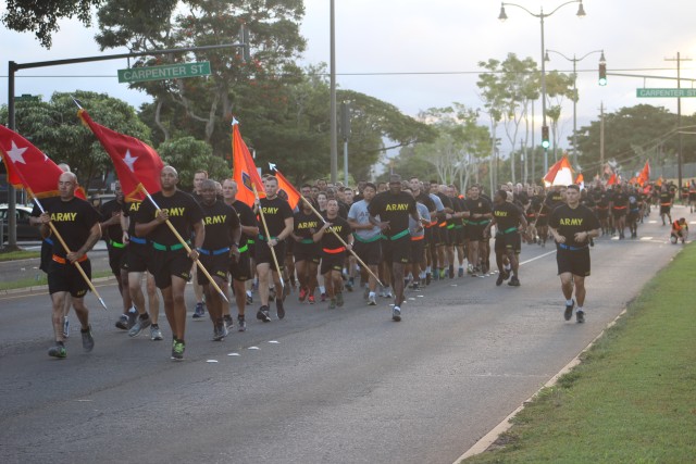 Singing running cadences, Signal Soldiers from Army commands across Oahu participate in the annual four-mile Signal Regimental Run on Schofield Barracks, Sep. 22. The purpose of the run was to build p