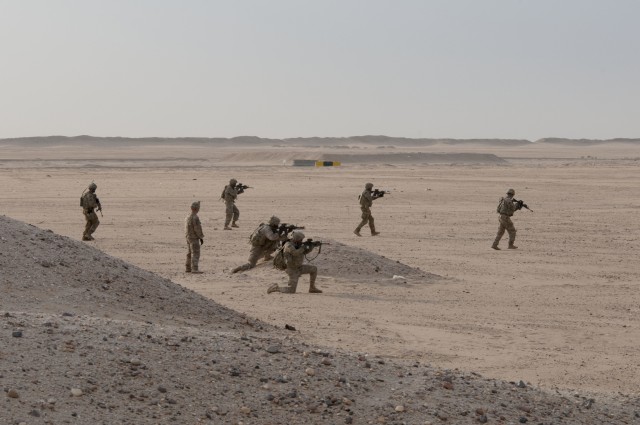 Infantrymen assault the objective on foot