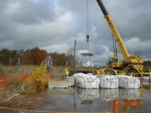 Loading supersacks into a railcar at the FUSRAP site in Painesville, OH.