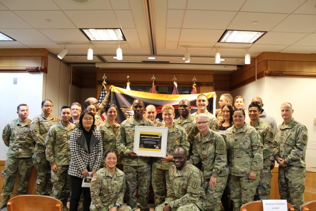 Brig. Gen. Providence presents the Safety Star Banner to BAACH