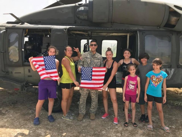 New York Army Guard aviators flew relief supplies and people to support Puerto Rico