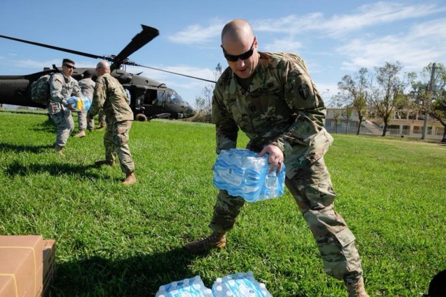 New York Army Guard aviators flew relief supplies and people to support Puerto Rico