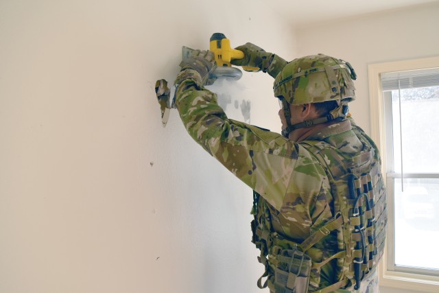 The 774th Explosive Ordnance Disposal Company at Fort Riley used vacant housing mark for demolition to train in non-standard entry.