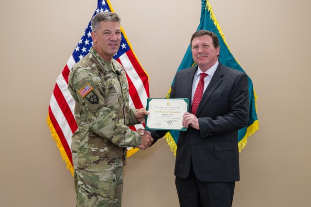 RTC Commander Col. John W. Jones presented Rob Stone with his Certificate of Promotion upon being selected as the RTC Technical Director.         