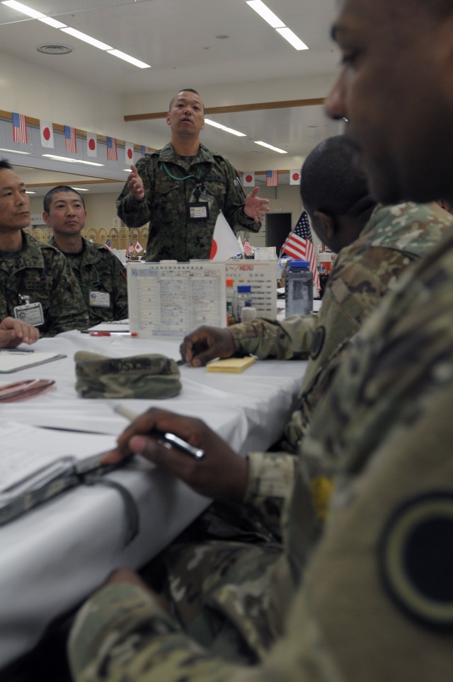 U.S. and Japanese Soldiers collaborate during Noncommissioned Officer Forum