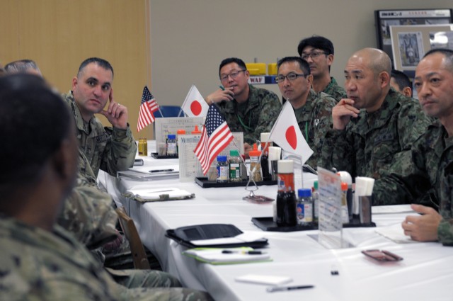 U.S. and Japanese Soldiers collaborate during Noncommissioned Officer Forum