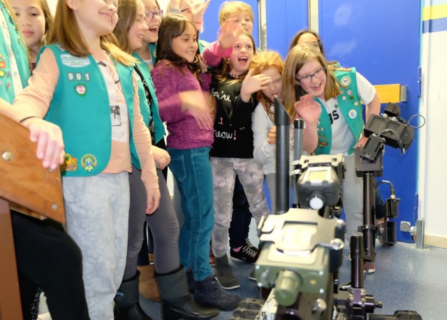Army Reserve Soldiers help Girl Scouts learn about robots