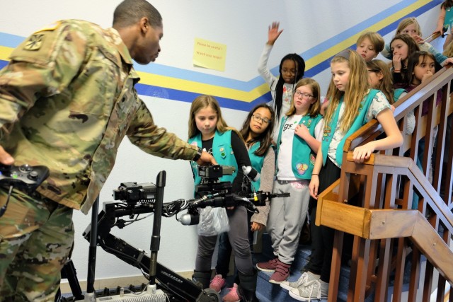 Army Reserve Soldiers help Girl Scouts learn about robots