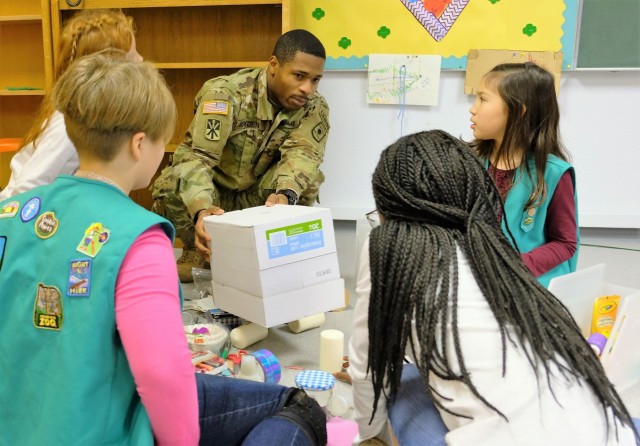 Army Reserve Soldiers help Girl Scouts learn about robots