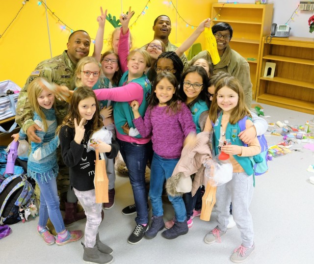 Army Reserve Soldiers help Girl Scouts learn about robots