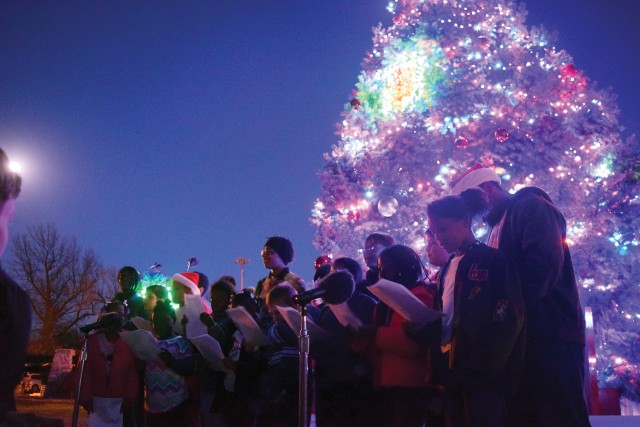 The 1st Infantry Division and Fort Riley officially ushered in the holiday season with the lighting of the holiday tree Dec. 1.